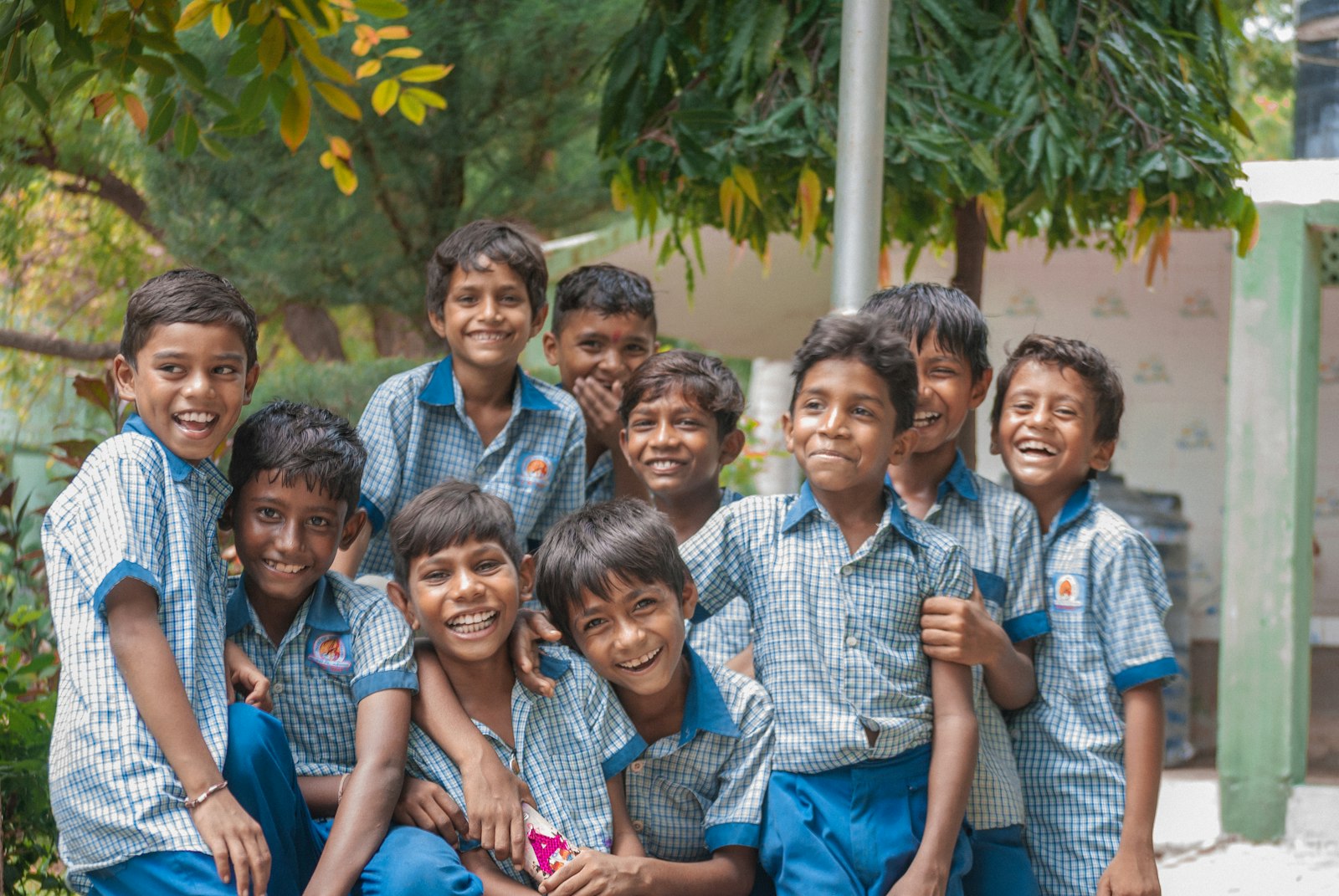 Group of Indian schoolboys in blue uniforms