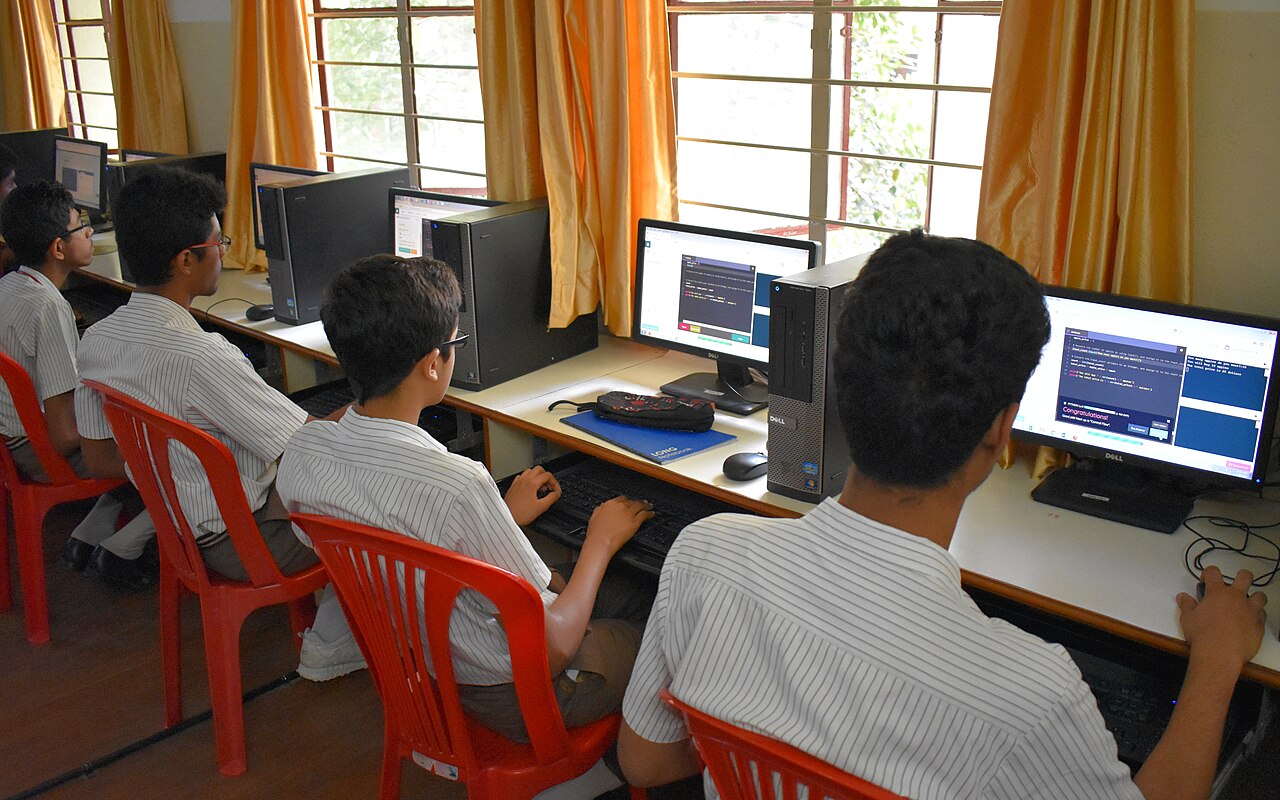 Students at a school in Bengaluru working on computers in a lab