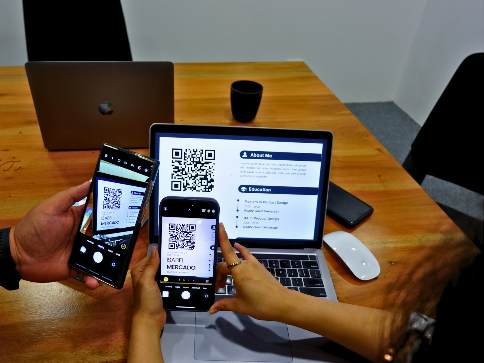 Two people at a table using their phones